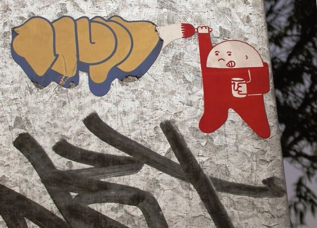 Tache, sticker urbano.